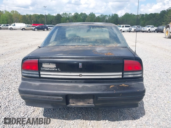 1996 Oldsmobile Cutlass Supreme S z VIN 1G3WH52M2TF363353, wystawiony jako IAAI lot #41955292 z przebiegiem 143 347 mil mil oraz . Historia ofert i sprzedaży dostępna na DreamBid. Obrazek 14.