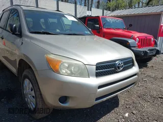 2006 Toyota RAV4 with VIN JTMZD33V866004405, listed as a IAAI auction lot 42090377 with 132,232 mi miles. Bid and sale history available at carsss.com. Image 13.