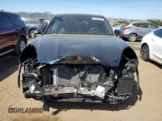 2022 Porsche Cayenne with VIN WP1AA2AY5NDA04335, listed as a Copart auction lot 57320915 with 7,017 mi miles and Salvage title. Bid and sale history available at DreamBid. Image 5.