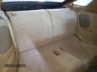 1999 Mitsubishi 3000GT z VIN JA3AM44H3XY001394, wystawiony jako Copart lot #75942814 z przebiegiem 75 146 mil mil oraz Tytuł czysty. Historia ofert i sprzedaży dostępna na DreamBid. Obrazek 10.