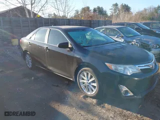 2012 Toyota Camry Hybrid XLE with VIN 4T1BD1FK3CU030064, listed as a IAAI auction lot 41872634 with 373,897 mi miles. Bid and sale history available at carsss.com. Image 13.