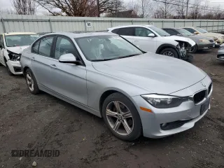 2014 BMW 3 Series 328i xDrive with VIN WBA3B5G53ENS06927, listed as a Copart auction lot 52871955 with 178,753 mi miles and Salvage Title. Bid and sale history available at DreamBid. Image 4.