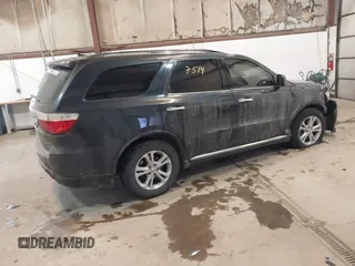 2013 Dodge Durango Crew z VIN 1C4RDJDG7DC661411, wystawiony jako IAAI lot #41617514 z przebiegiem 145 309 mil mil oraz . Historia ofert i sprzedaży dostępna na DreamBid. Obrazek 4.