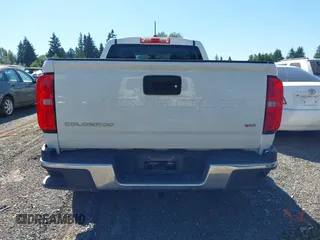 2021 Chevrolet Colorado 4WD Work Truck with VIN 1GCGTBEN0M1233723, listed as a IAAI auction lot 42600025 with 58,906 mi miles and . Bid and sale history available at DreamBid. Image 16.
