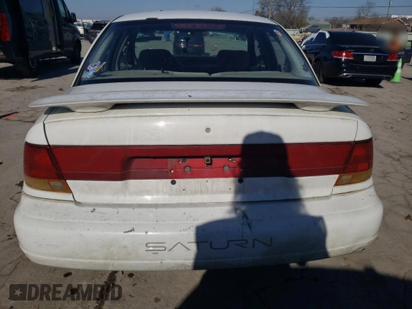 1996 Saturn SL with VIN 1G8ZK5272TZ207640, listed as a Copart auction lot 42538255 with 213,813 mi miles and Clean title. Bid and sale history available at DreamBid. Image 6.