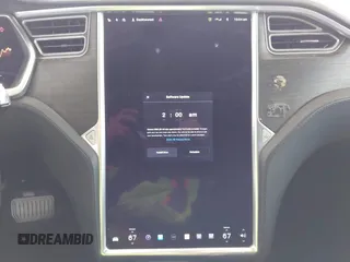 2014 Tesla Model S 60 with VIN 5YJSA1H16EFP32585, listed as a IAAI auction lot 42068925 with 119,561 mi miles and . Bid and sale history available at DreamBid. Image 18.