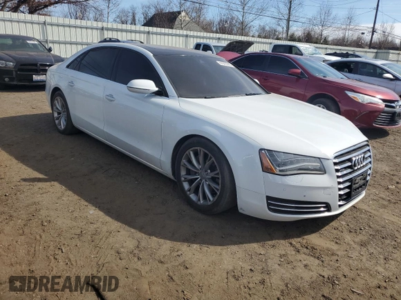 2014 Audi A8 3.0T z VIN WAURGAFD5EN007438, wystawiony jako Copart lot #47979945 z przebiegiem 147 236 mil mil oraz Szkody całkowita. Historia ofert i sprzedaży dostępna na DreamBid. Obrazek 4.