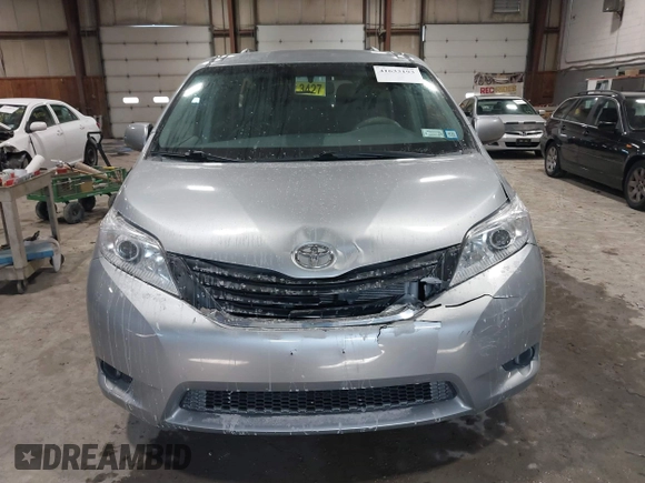 2013 Toyota Sienna LE with VIN 5TDJK3DC0DS056429, listed as a IAAI auction lot 41633193 with 167,321 mi miles and . Bid and sale history available at DreamBid. Image 12.