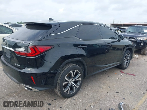 2018 Lexus RX 350 z VIN 2T2ZZMCA1JC103844, wystawiony jako IAAI lot #42138509 z przebiegiem 118 754 mil mil oraz . Historia ofert i sprzedaży dostępna na DreamBid. Obrazek 4.