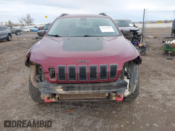 2019 Jeep Cherokee Trailhawk Elite with VIN 1C4PJMBX3KD483704, listed as a IAAI auction lot 40994848 with 176,770 mi miles. Bid and sale history available at carsss.com. Image 13.