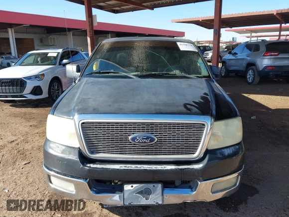 2005 Ford F-150 XLT with VIN 1FTPX12525NB25391, listed as a IAAI auction lot 41588721 with 241,743 mi miles. Bid and sale history available at carsss.com. Image 12.