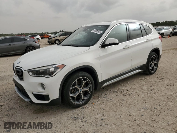 2019 BMW X1 sDrive28i with VIN WBXHU7C57K3H44192, listed as a Copart auction lot 49882335 with 79,350 mi miles and Salvage Title. Bid and sale history available at carsss.com. Image 1.