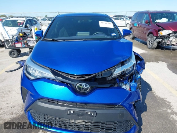 2021 Toyota C-HR LE z VIN NMTKHMBX0MR129151, wystawiony jako IAAI lot #41990301 z przebiegiem 25 277 mil mil oraz . Historia ofert i sprzedaży dostępna na DreamBid. Obrazek 13.