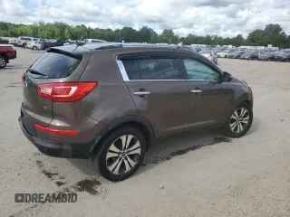 2012 Kia Sportage EX z VIN KNDPC3A29C7194059, wystawiony jako Copart lot #65810625 z przebiegiem 138 016 mil mil oraz Szkoda całkowita • Salvage title. Historia ofert i sprzedaży dostępna na DreamBid. Obrazek 3.