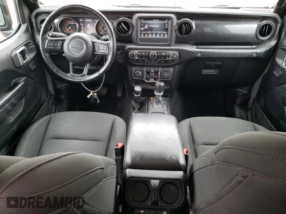 2020 Jeep Wrangler Unlimited Sport Altitude with VIN 1C4HJXDG2LW314301, listed as a Copart auction lot 59857615 with 60,684 mi miles and Salvage title. Bid and sale history available at DreamBid. Image 8.