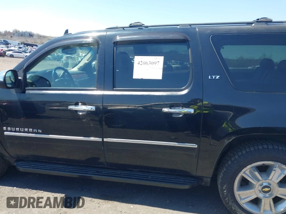2009 Chevrolet Suburban LTZ with VIN 1GNFK36399J124158, listed as a IAAI auction lot 42063097 with 204,856 mi miles. Bid and sale history available at carsss.com. Image 14.