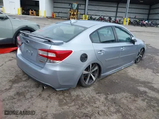 2017 Subaru Impreza Sport with VIN 4S3GKAK67H1614131, listed as a IAAI auction lot 41769973 with 137,655 mi miles. Bid and sale history available at carsss.com. Image 4.