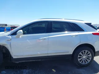 2017 Cadillac XT5 Luxury AWD z VIN 1GYKNDRS8HZ120863, wystawiony jako IAAI lot #42101279 z przebiegiem 100 535 mil mil oraz . Historia ofert i sprzedaży dostępna na DreamBid. Obrazek 15.