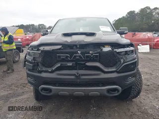 2022 Ram 1500 TRX with VIN 1C6SRFU9XNN476106, listed as a IAAI auction lot 41627895 with 21,992 mi miles and . Bid and sale history available at DreamBid. Image 12.