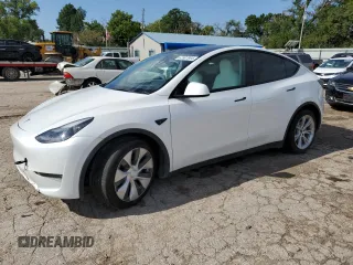2023 Tesla Model Y Long Range with VIN 7SAYGAEE6PF795434, listed as a Copart auction lot 67507984 with 24,469 mi miles and Salvage Title. Bid and sale history available at DreamBid. Image 1.