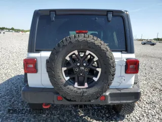 2025 Jeep Wrangler Rubicon with VIN 1C4PJXFN2SW525858, listed as a Copart auction lot 57415905 with 7,802 mi miles and Salvage title. Bid and sale history available at DreamBid. Image 6.