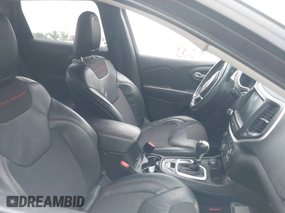 2016 Jeep Cherokee Trailhawk with VIN 1C4PJMBS4GW179121, listed as a IAAI auction lot 42516635 with 110,056 mi miles and . Bid and sale history available at DreamBid. Image 5.