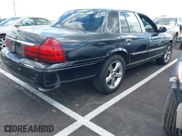 2003 Mercury Grand Marquis LS Premium with VIN 2MEHM75W23X672191, listed as a IAAI auction lot 42198997 with 137,525 mi miles and . Bid and sale history available at DreamBid. Image 4.
