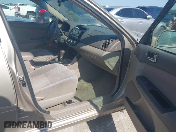 2006 Toyota Camry STD with VIN 4T1BE32KX6U148521, listed as a IAAI auction lot 42014266 with 148,694 mi miles. Bid and sale history available at carsss.com. Image 5.