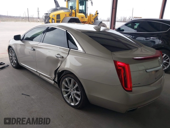 2015 Cadillac XTS Luxury z VIN 2G61M5S39F9246298, wystawiony jako IAAI lot #41555093 z przebiegiem 126 928 mil mil oraz . Historia ofert i sprzedaży dostępna na DreamBid. Obrazek 3.