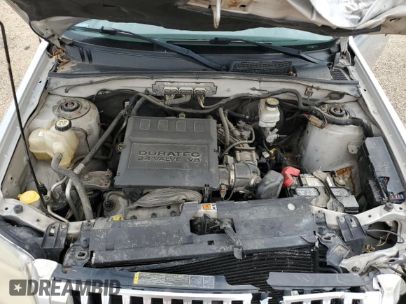 2010 Mercury Mariner with VIN 4M2CN9BGXAKJ08462, listed as a Copart auction lot 59095375 with 197,360 mi miles and Salvage title. Bid and sale history available at DreamBid. Image 12.