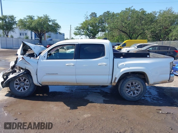 2017 Toyota Tacoma SR5 with VIN 5TFAZ5CNXHX044976, listed as a IAAI auction lot 42052922 with 149,116 mi miles and . Bid and sale history available at DreamBid. Image 14.