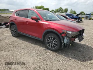 2018 Mazda CX-5 Touring with VIN JM3KFACM8J1469772, listed as a Copart auction lot 54863415 with 97,592 mi miles and Salvage Title. Bid and sale history available at carsss.com. Image 4.