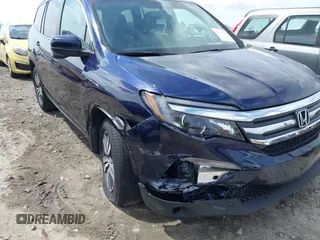 2018 Honda Pilot EX-L with VIN 5FNYF5H5XJB025960, listed as a IAAI auction lot 41843520 with 23,404 mi miles and . Bid and sale history available at DreamBid. Image 6.