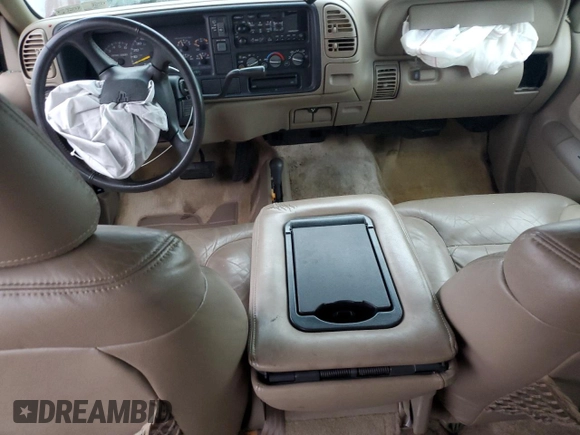 1999 Chevrolet Suburban with VIN 1GNFK16R7XJ402741, listed as a Copart auction lot 73283404 with 143,943 mi miles and Salvage Title. Bid and sale history available at carsss.com. Image 8.