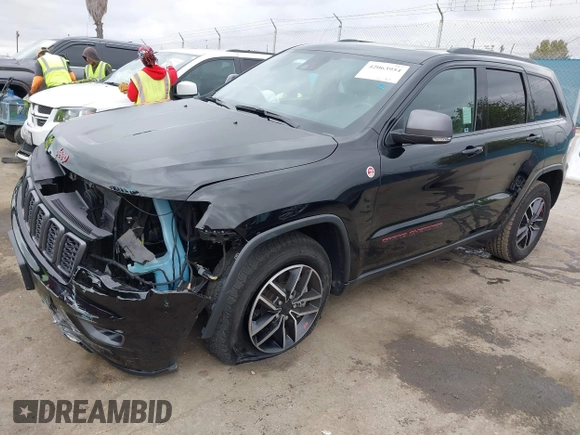 2021 Jeep Grand Cherokee Trailhawk with VIN 1C4RJFLT4MC771773, listed as a IAAI auction lot 42063954 with 17,920 mi miles and . Bid and sale history available at DreamBid. Image 2.