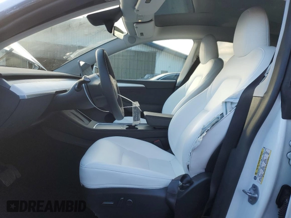 2023 Tesla Model Y Long Range with VIN 7SAYGAEE1PF967353, listed as a Copart auction lot 88700135 with 16,249 mi miles and Salvage Title. Bid and sale history available at DreamBid. Image 7.