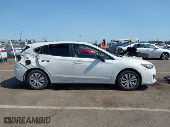 2018 Subaru Impreza with VIN 4S3GTAA64J3717886, listed as a IAAI auction lot 42572412 with 91,911 mi miles and . Bid and sale history available at DreamBid. Image 13.