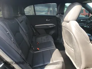 2019 Cadillac XT4 AWD Premium Luxury with VIN 1GYFZDR4XKF170289, listed as a Copart auction lot 52112025 with 100,524 mi miles and Salvage Title. Bid and sale history available at carsss.com. Image 10.