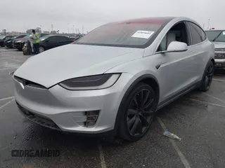 2016 Tesla Model X P90D with VIN 5YJXCBE41GF006284, listed as a IAAI auction lot 41809683 with 71,135 mi miles. Bid and sale history available at carsss.com. Image 19.