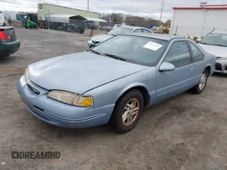 1997 Ford Thunderbird LX with VIN 1FALP62W2VH105702, listed as a IAAI auction lot 41713980 with 90,775 mi miles and . Bid and sale history available at DreamBid. Image 2.