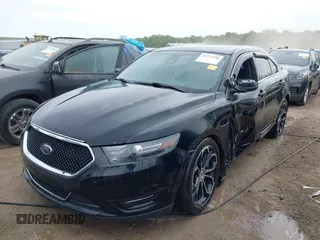 2016 Ford Taurus SHO with VIN 1FAHP2KT2GG100643, listed as a IAAI auction lot 42277356 with 113,215 mi miles and . Bid and sale history available at DreamBid. Image 2.