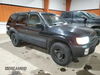 2000 Infiniti QX4 z VIN JNRAR07Y6YW080306, wystawiony jako Copart lot #85022064 z przebiegiem 278 383 mil mil oraz Tytuł czysty. Historia ofert i sprzedaży dostępna na DreamBid. Obrazek 4.