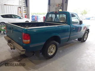 1995 Ford Ranger Splash z VIN 1FTCR10A8SUC00962, wystawiony jako IAAI lot #42594840 z przebiegiem 173 290 mil mil oraz . Historia ofert i sprzedaży dostępna na DreamBid. Obrazek 4.