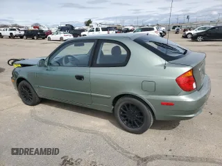 2003 Hyundai Accent GL with VIN KMHCG35C13U270585, listed as a Copart auction lot 50197935 with 53,822 mi miles and Salvage Title. Bid and sale history available at carsss.com. Image 2.