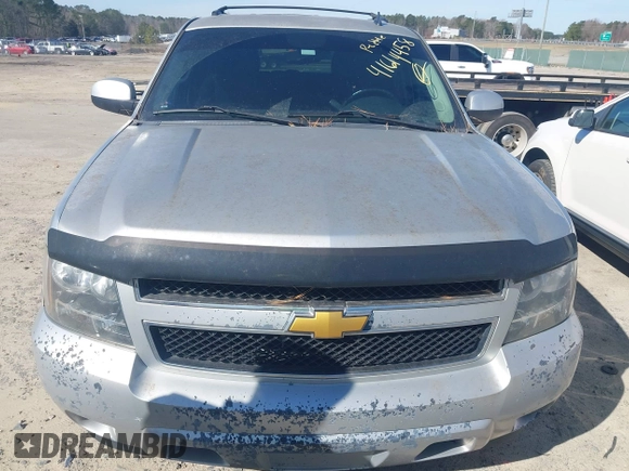 2013 Chevrolet Tahoe LS with VIN 1GNSCAE00DR361459, listed as a IAAI auction lot 41614458 with 171,925 mi miles and . Bid and sale history available at DreamBid. Image 6.
