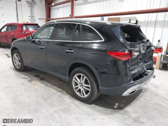 2023 Mercedes-Benz GLC with VIN W1NKM4HB1PU020439, listed as a IAAI auction lot 41676723 with 25,609 mi miles. Bid and sale history available at carsss.com. Image 3.