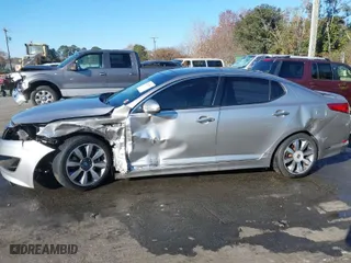 2012 Kia Optima SX with VIN 5XXGR4A6XCG030348, listed as a IAAI auction lot 41002991 with 170,010 mi miles. Bid and sale history available at carsss.com. Image 6.