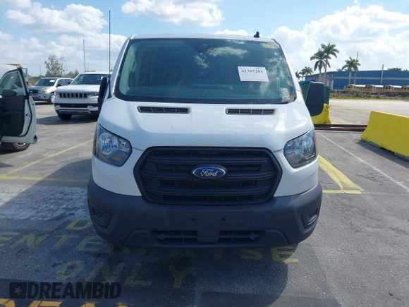 2020 Ford Transit Cargo with VIN 1FTYE1Y8XLKB80973, listed as a IAAI auction lot 41707281 with 112,721 mi miles and . Bid and sale history available at DreamBid. Image 6.