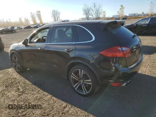 2012 Porsche Cayenne Turbo with VIN WP1AC2A26CLA82602, listed as a Copart auction lot 77752814 with 115,965 mi miles and Salvage title. Bid and sale history available at DreamBid. Image 2.