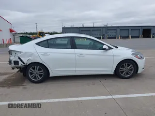 2018 Hyundai Elantra SEL z VIN 5NPD84LFXJH248150, wystawiony jako IAAI lot #41930053 z przebiegiem 127 300 mil mil oraz . Historia ofert i sprzedaży dostępna na DreamBid. Obrazek 14.
